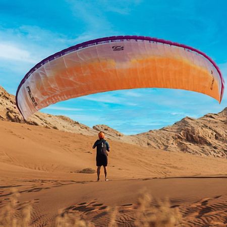 Al Badayer Retreat By Sharjah Collection Hotel Margham Exterior foto Parachute landing on the dunes